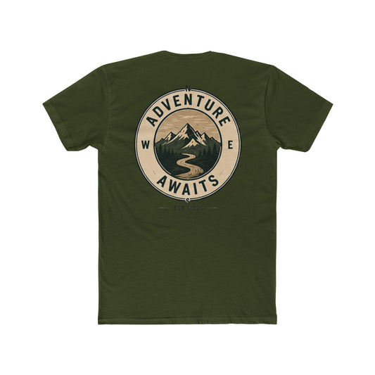 An olive green short-sleeve t-shirt shown from the back, featuring a large circular graphic print with a mountain and river illustration and the words 'ADVENTURE AWAITS'.