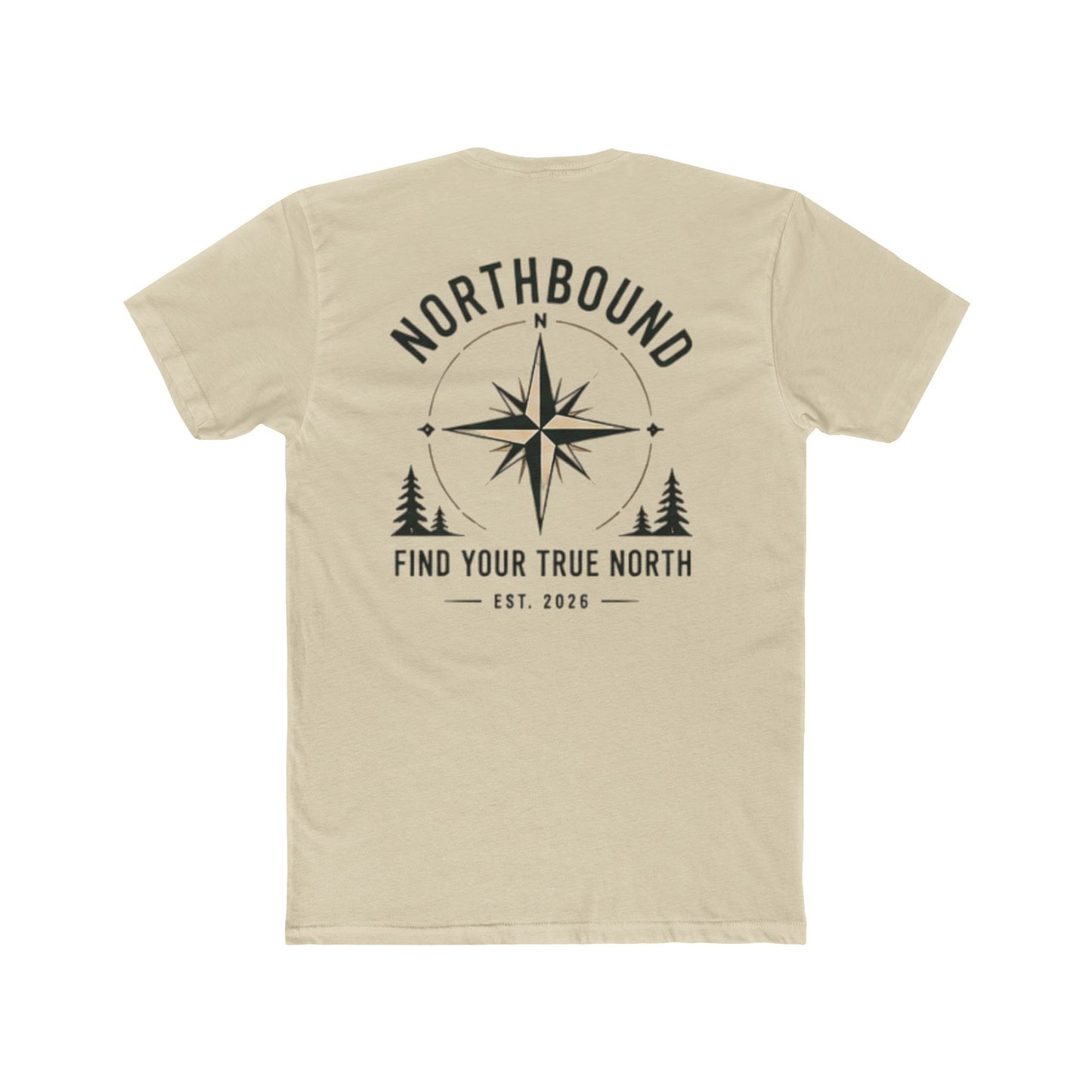 A light beige crewneck t-shirt shown from the back, featuring a black graphic print with a compass rose, pine trees, and the text 'NORTHBOUND' and 'FIND YOUR TRUE NORTH EST. 2026'.