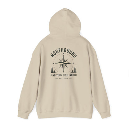 A beige pullover hoodie shown from the back, featuring a black compass rose graphic with the text 'NORTHBOUND' and 'FIND YOUR TRUE NORTH' on a white background.