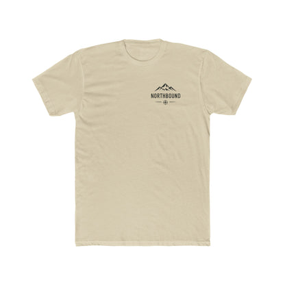 A light beige crewneck t-shirt with a small black and white wolf graphic printed on the left chest, displayed flat against a solid white background.